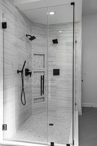 A white showerd remodel from Summit Renovation Group in The Woodlands