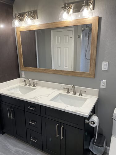 Twin his and her sinks from Summit Renovation Group.